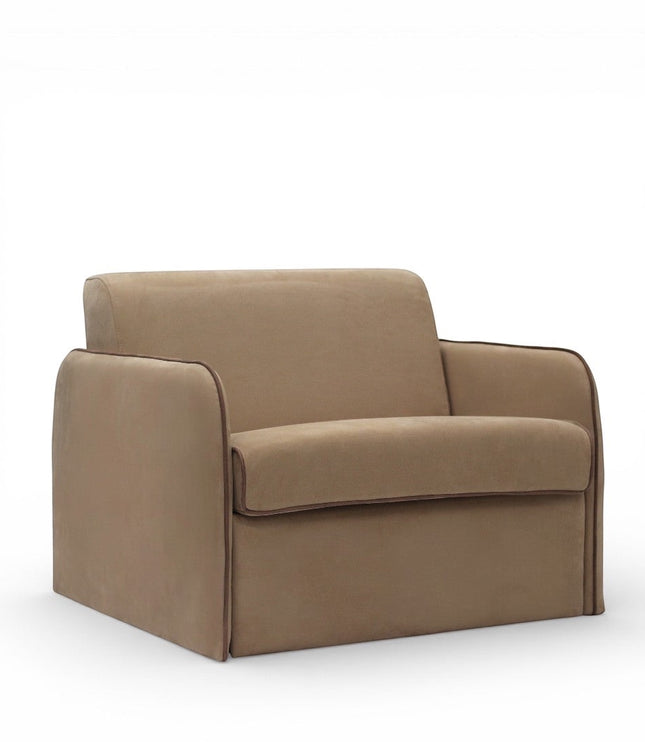 Angled view of the Vaya Home Eira sleeper chair with beige upholstery, wide arms, and a compact modern silhouette.