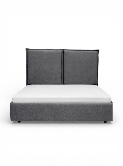 Front view of the Vaya Home Elmon upholstered bed with a grey fabric base and paneled headboard.