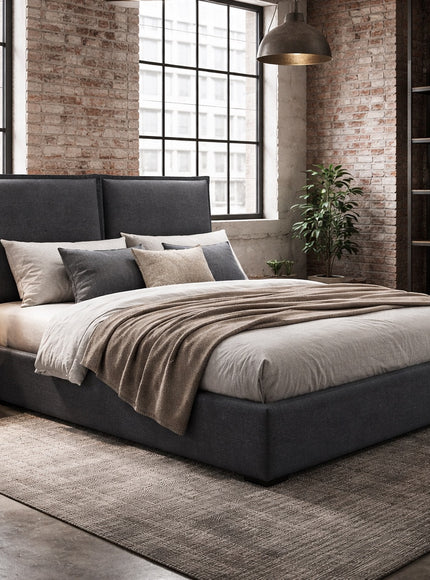 Vaya Home Elmon upholstered bed in grey fabric with a paneled headboard, styled in a modern bedroom.