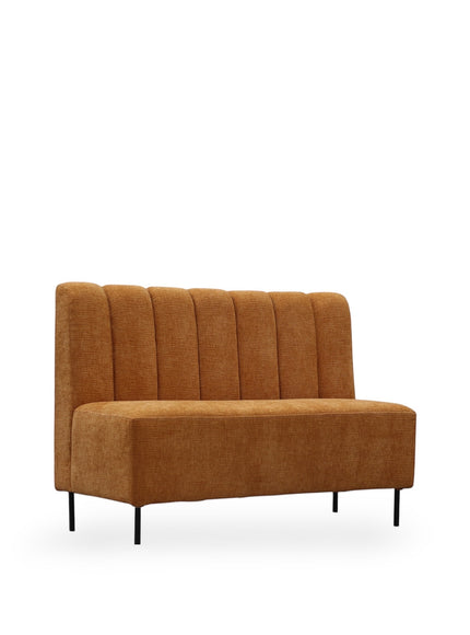 Angled view of the Vaya Home Elteo bench sofa in orange upholstery with a channel-tufted backrest and slim black legs.