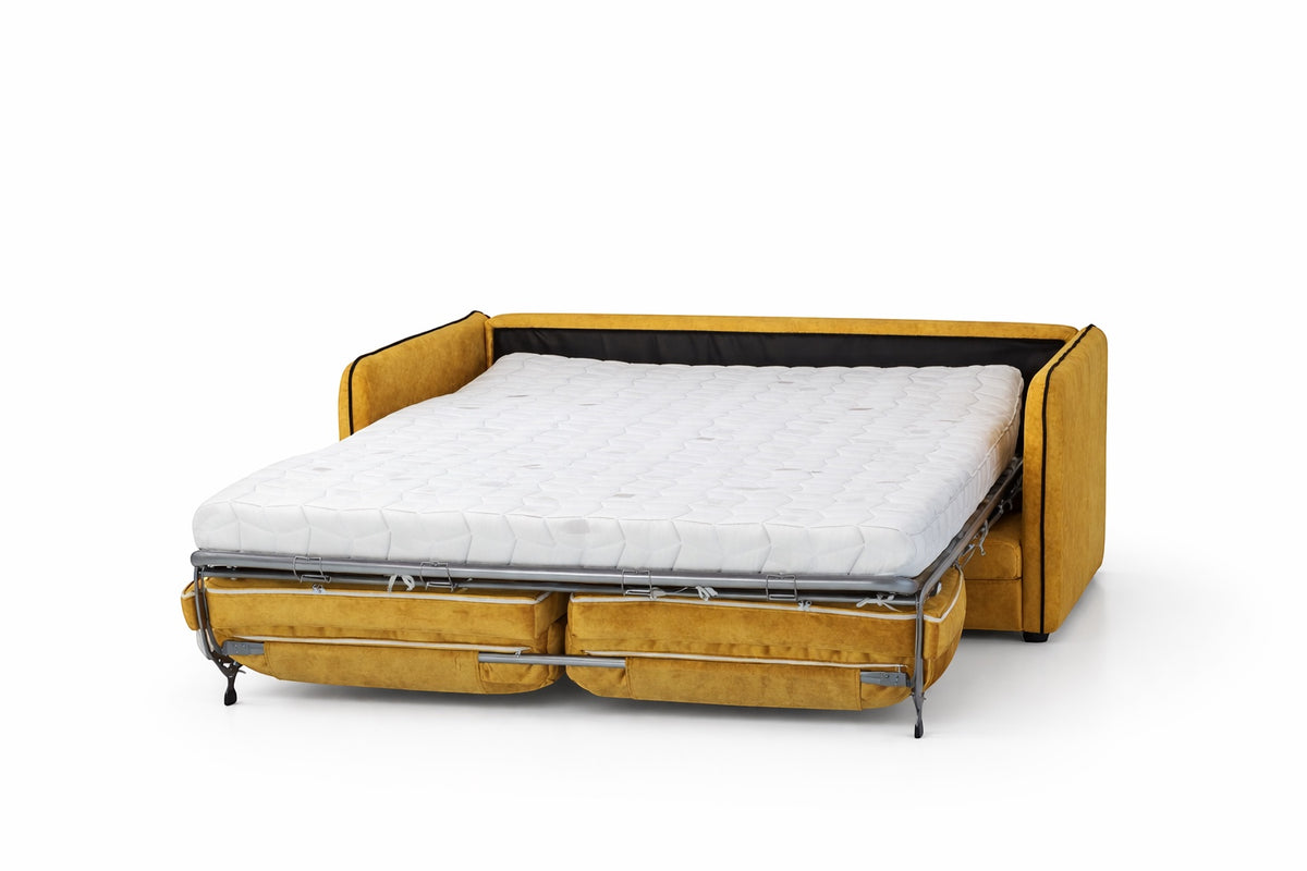 Vaya Home Fiorella mustard velvet sofa bed opened into a sleeper with exposed mattress.
