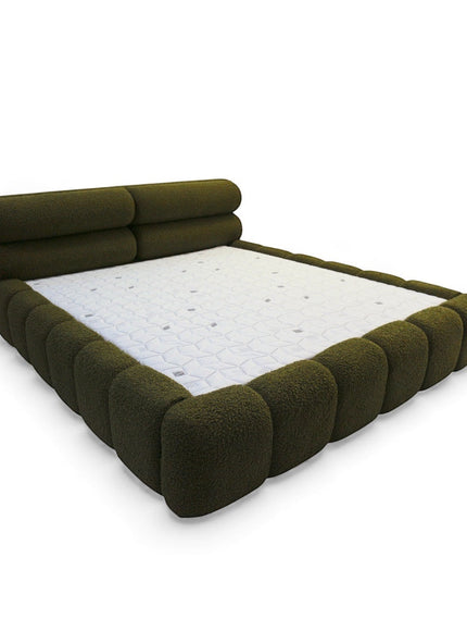 Vaya Home Forma bed in olive green upholstery with a low profile frame and padded channel-style detailing.
