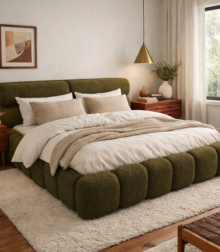 Vaya Home Forma bed in olive green upholstery, styled in a modern bedroom.