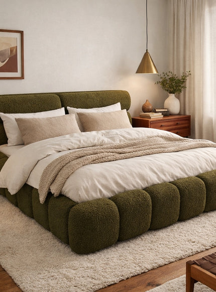 Vaya Home Forma bed in olive green upholstery, styled in a modern bedroom.