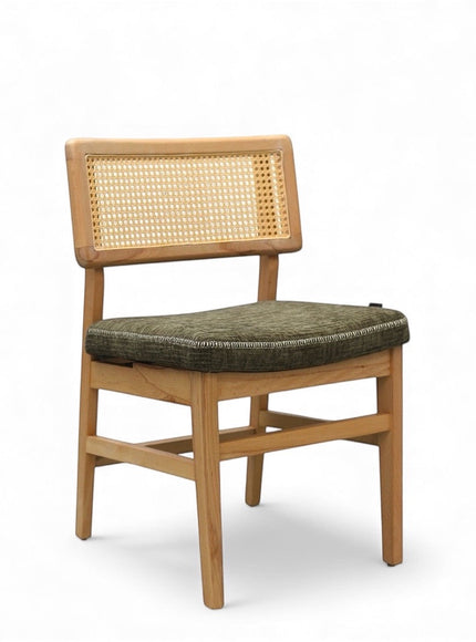Vaya Home Lino dining chair with a cane backrest, natural wood frame, and upholstered seat cushion.