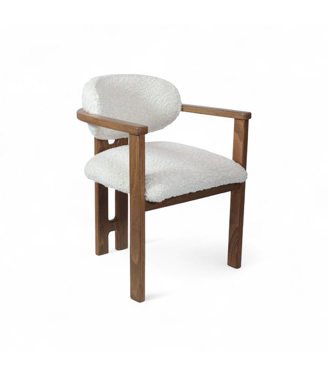 Front view of the Vaya Home Loft dining chair with white boucle upholstery, rounded back cushion, and a warm wood frame.