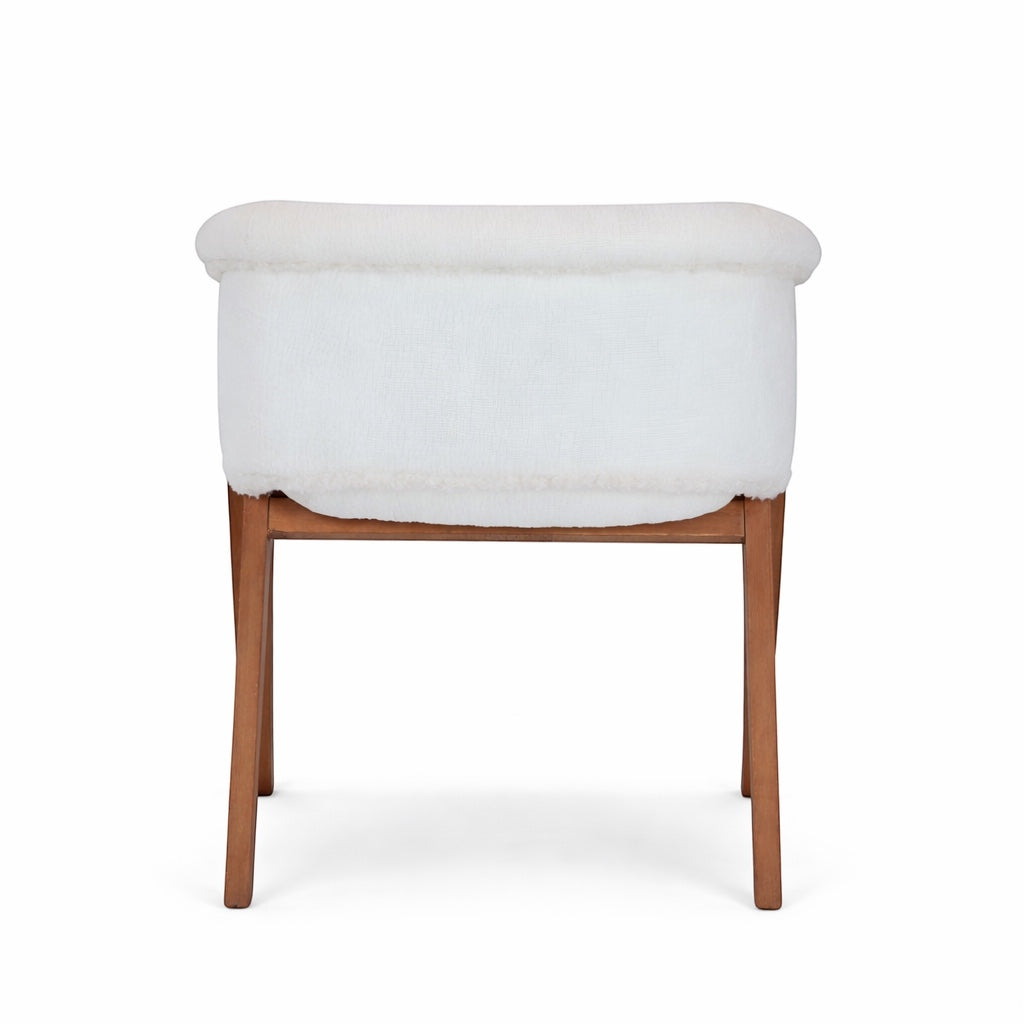 Back view of the Vaya Home Masiccio dining chair featuring white boucle upholstery and a wood frame.