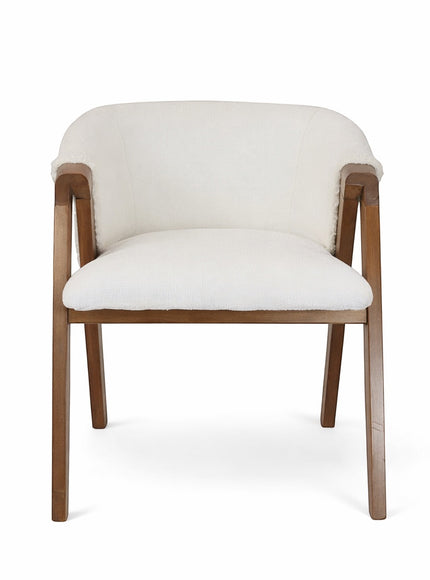 Front view of the Vaya Home Masiccio dining chair with white boucle upholstery, curved backrest, and wood arms.