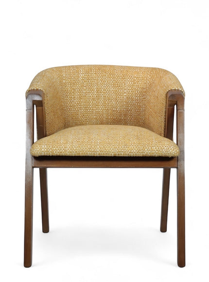 Front view of the Vaya Home Masiccio dining chair with yellow woven upholstery, curved backrest, and wood arms.