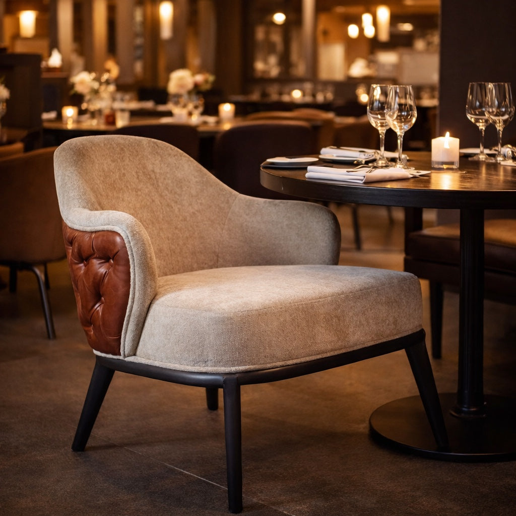 Vaya Home Mattonne accent chair with beige upholstery, a tufted burgundy outer back, and black legs, styled in an elegant dining setting.
