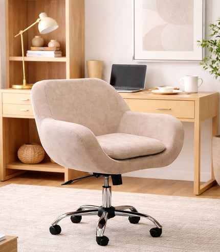 Vaya Home Milan swivel office chair in beige upholstery with a chrome base, styled in a modern home office.