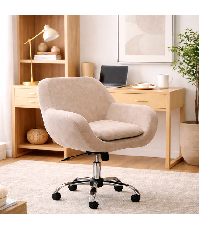 Vaya Home Milan swivel office chair in beige upholstery with a chrome base, styled in a modern home office.