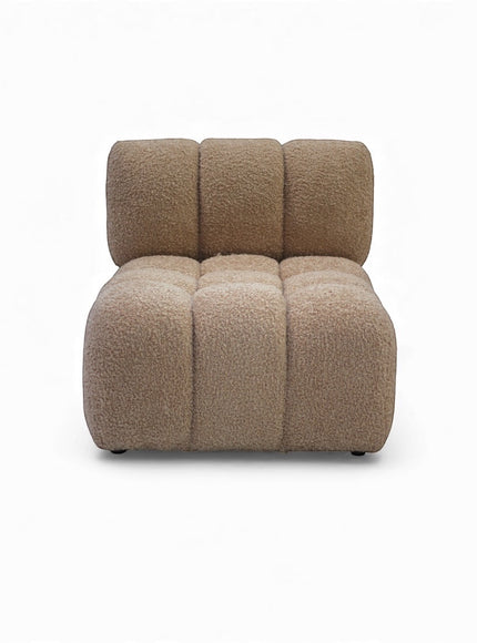 Front view of the Vaya Home Moducube central module with beige boucle upholstery and channel-style cushioning.
