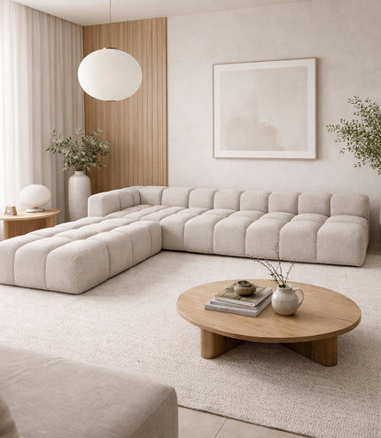Vaya Home Monolith modular sectional sofa in cream upholstery, styled in a modern living room.