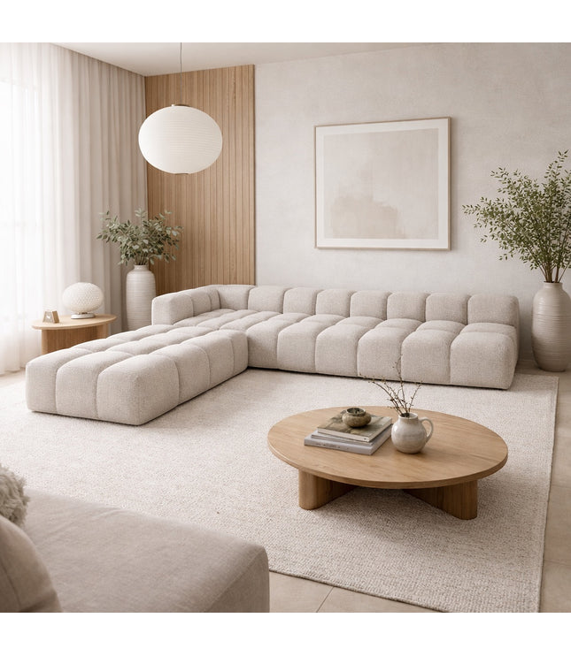 Vaya Home Monolith modular sectional sofa in cream upholstery, styled in a modern living room.
