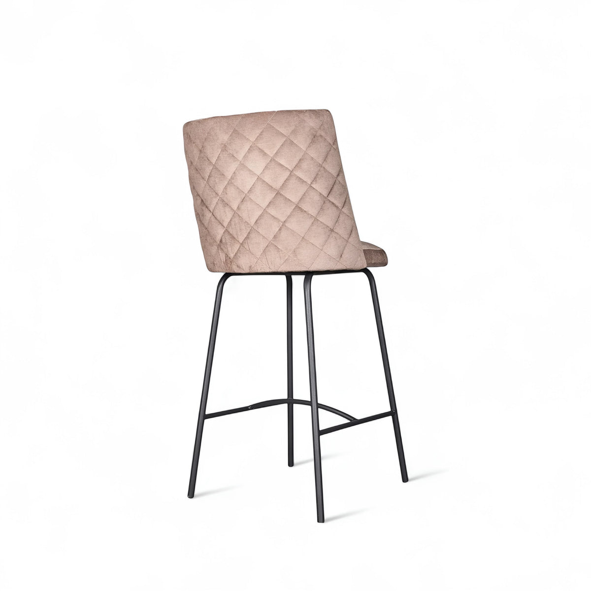 Product view of the Vaya Home Morkrod bar stool in dark brown quilted upholstery with black metal legs.