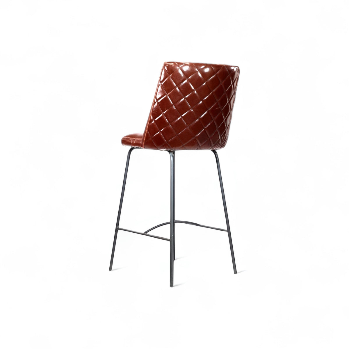 Rear angled view of the Vaya Home Morkrod bar stool with dark brown quilted upholstery and black metal legs.