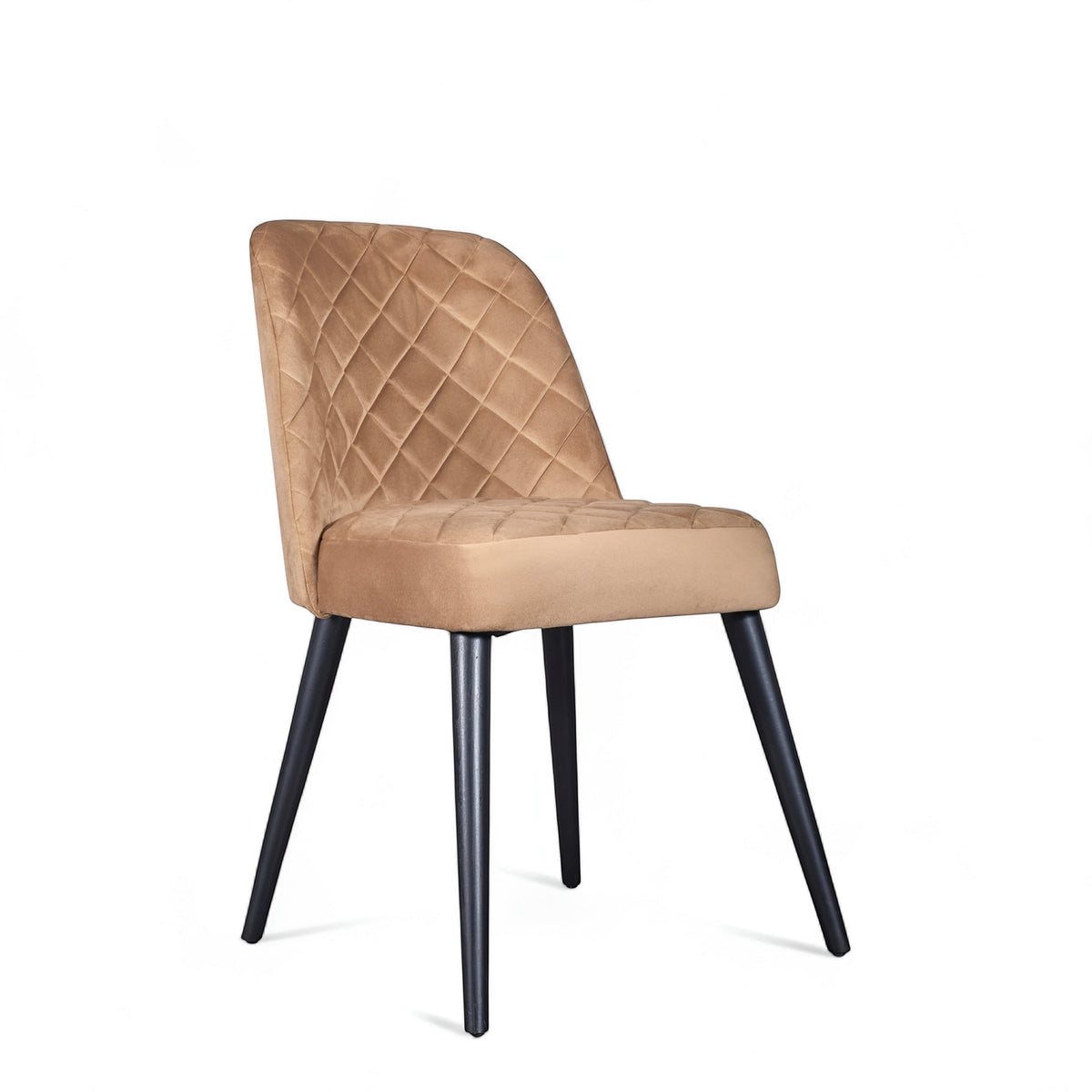 Front angled view of the Vaya Home Netto dining chair with beige upholstery, quilted back detail, and black tapered legs.