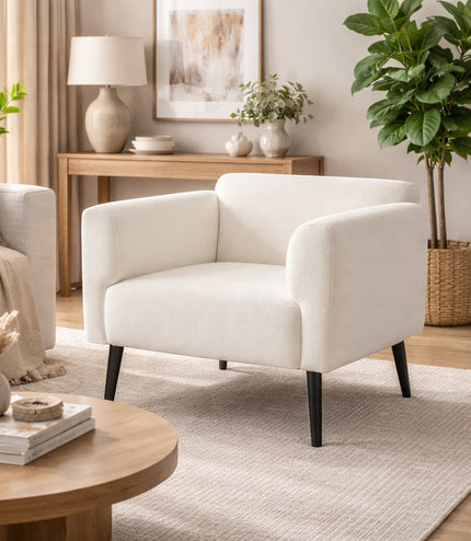 Vaya Home Nexus accent chair in white upholstery, styled in a bright modern living room.