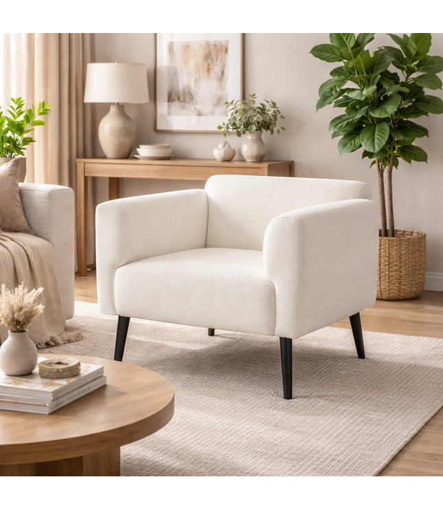 Vaya Home Nexus accent chair in white upholstery, styled in a bright modern living room.