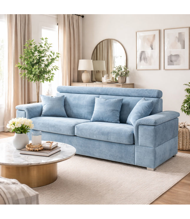 Vaya Home Opulence sofa in blue upholstery, styled in a bright modern living room.