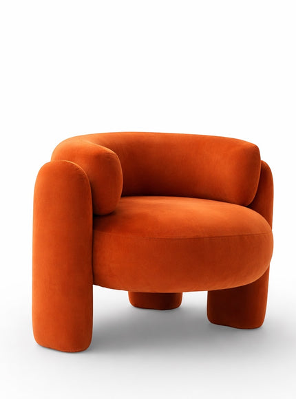 Angled front view of the Vaya Home Orbit accent chair with a rounded seat, curved back, and orange upholstered frame.