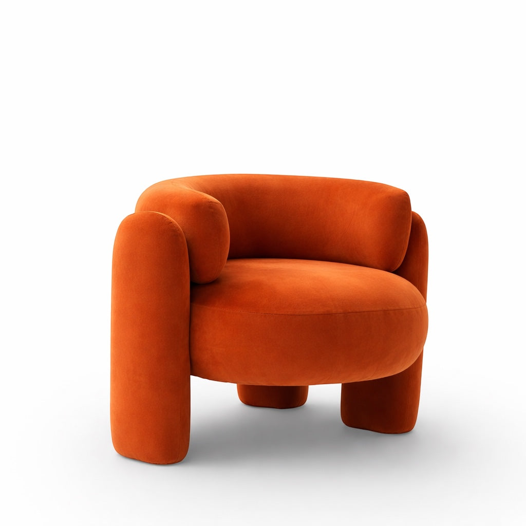 Angled front view of the Vaya Home Orbit accent chair with a rounded seat, curved back, and orange upholstered frame.