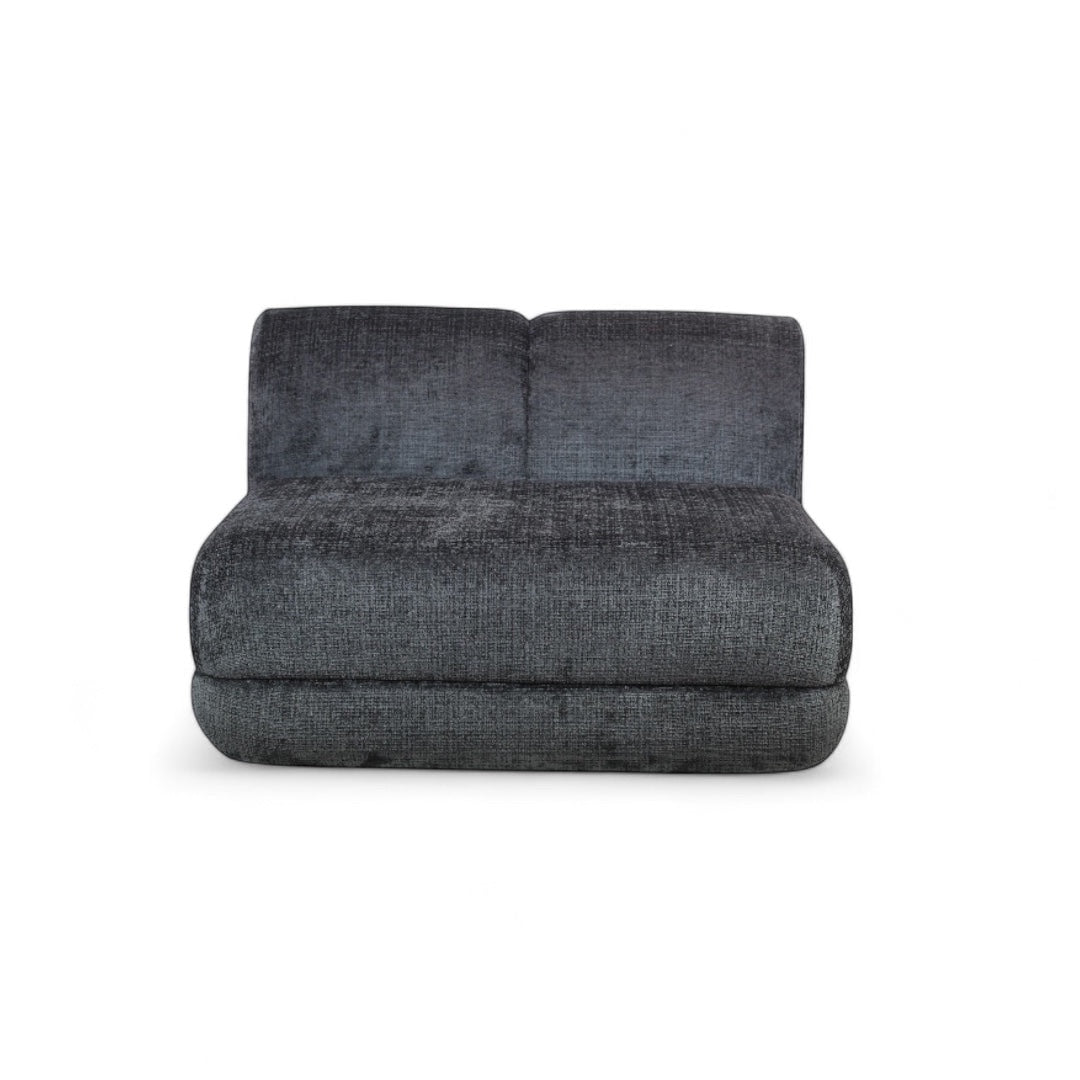 Front view of the Vaya Home Origin central module in charcoal textured upholstery.