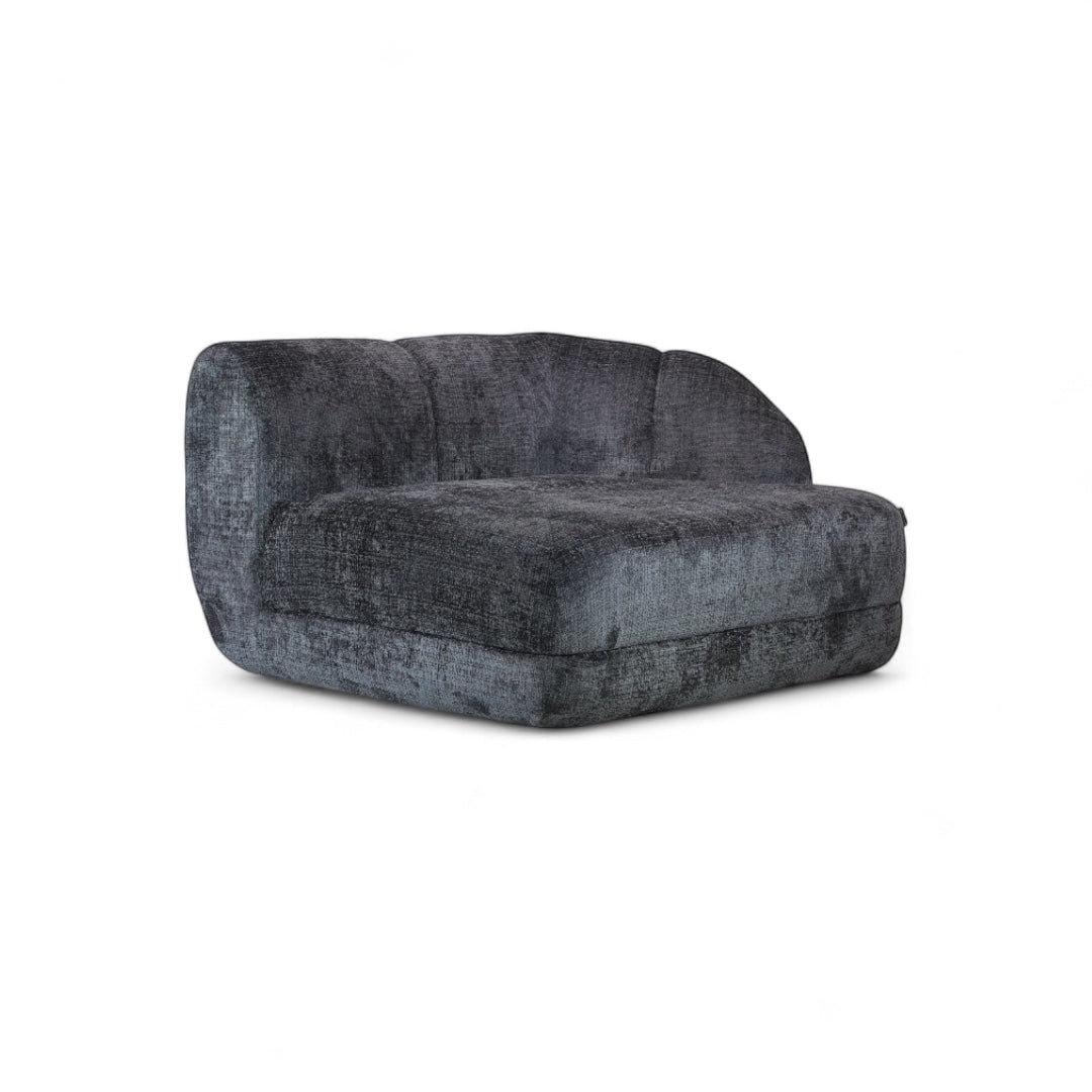 Front view of the Vaya Home Origin left corner module featuring charcoal textured upholstery and deep seat cushioning.