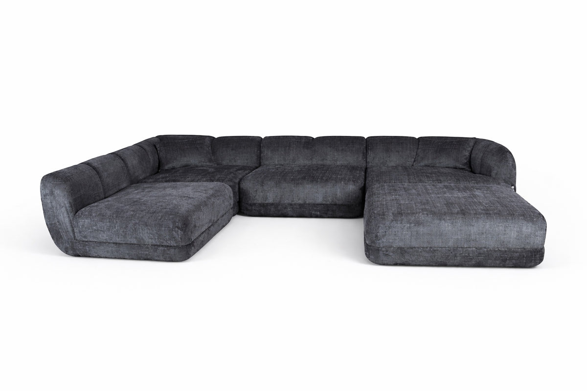 Front view of the Vaya Home Origin modular sectional sofa in charcoal textured upholstery.
