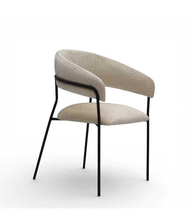Vaya Home Osso dining chair with cream upholstery, curved wraparound backrest, and black metal frame.