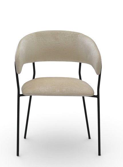 Front view of the Vaya Home Osso dining chair featuring cream upholstery, rounded backrest, and black metal legs.