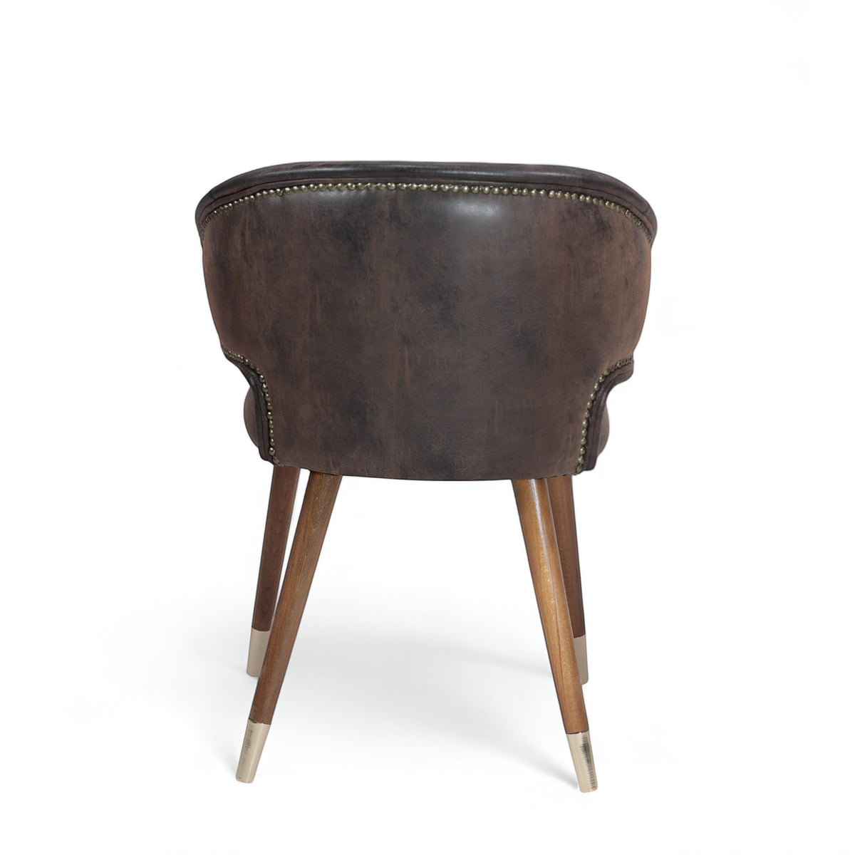 Back view of the Vaya Home Pelle accent chair featuring dark brown upholstery, a rounded back, and tapered wood legs with metal caps.