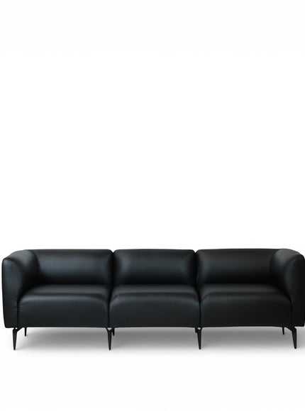 Front view of the Vaya Home Regalo sofa with black leather upholstery, segmented back cushions, and slim metal legs.