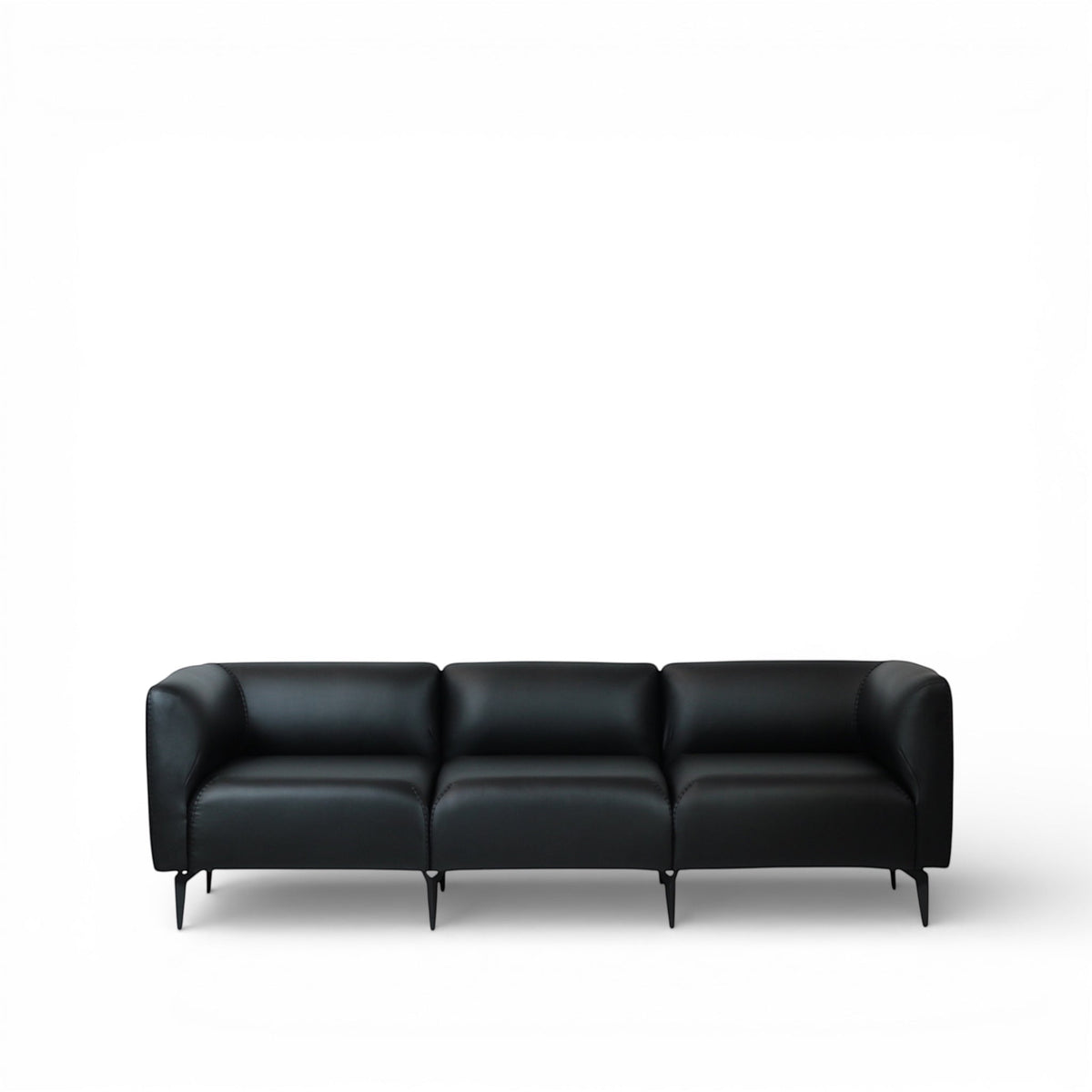 Front view of the Vaya Home Regalo sofa with black leather upholstery, segmented back cushions, and slim metal legs.
