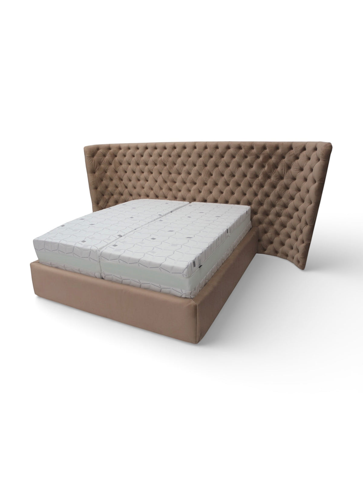 Angled front view of the Vaya Home Regent upholstered bed featuring taupe upholstery and a diamond-tufted wingback headboard.