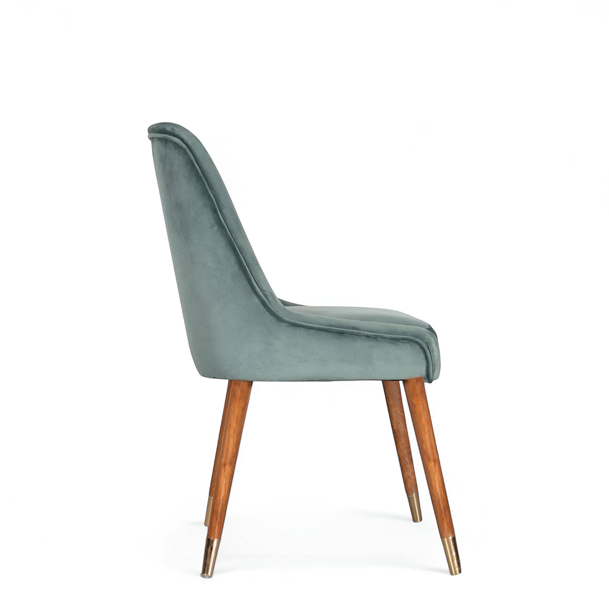 Side view of the Vaya Home Reverie dining chair with blue upholstery, slim profile, and tapered wood legs.