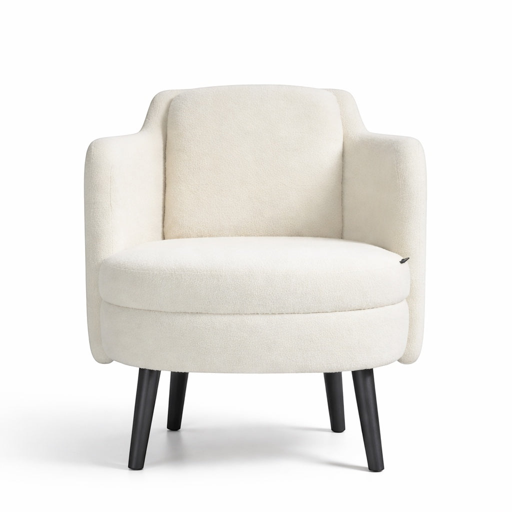 Front view of the Vaya Home Ribbon accent chair with ivory upholstery, rounded seat, and black tapered legs.