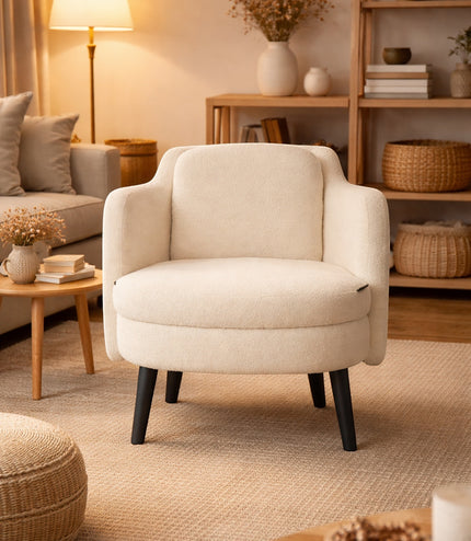 Vaya Home Ribbon accent chair in ivory upholstery, styled in a warm neutral living room.