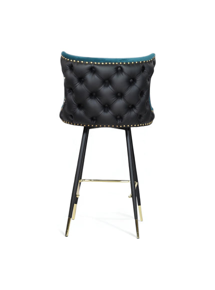 Back view of the Vaya Home Roket bar stool featuring a black button-tufted backrest, blue trim, and black metal legs with gold accents.