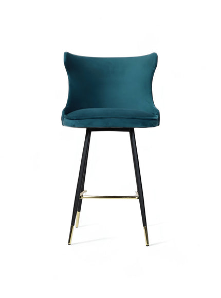 Front view of the Vaya Home Roket bar stool with blue upholstery, sculpted backrest, and black metal legs with gold accents.