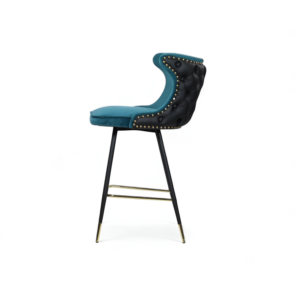 Opposite side view of the Vaya Home Roket bar stool featuring blue seat upholstery, black tufted back, and black metal legs with gold accents.