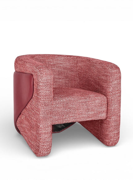 Angled front view of the Vaya Home Roxy accent chair with rose textured upholstery, rounded arms, and a sculptural silhouette.