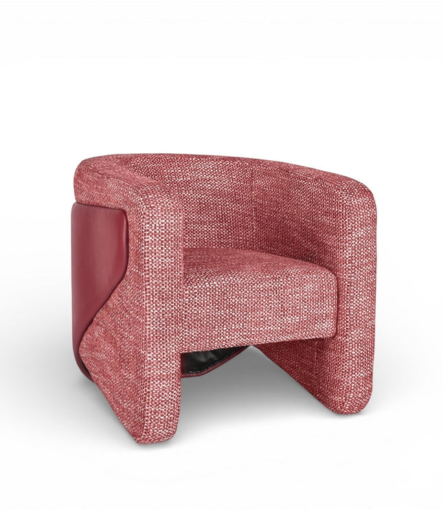 Angled front view of the Vaya Home Roxy accent chair with rose textured upholstery, rounded arms, and a sculptural silhouette.
