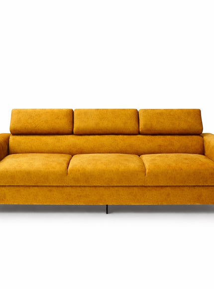 Front view of the Vaya Home Saffron modern sofa featuring mustard yellow upholstery, broad arms, and adjustable headrests in a raised position.