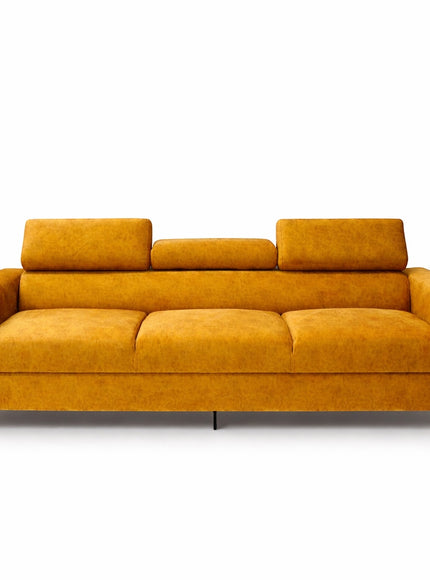 Angled front view of the Vaya Home Saffron sofa with mustard yellow upholstery, wide armrests, and adjustable headrests.