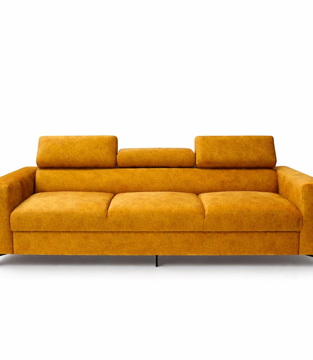 Angled front view of the Vaya Home Saffron sofa with mustard yellow upholstery, wide armrests, and adjustable headrests.