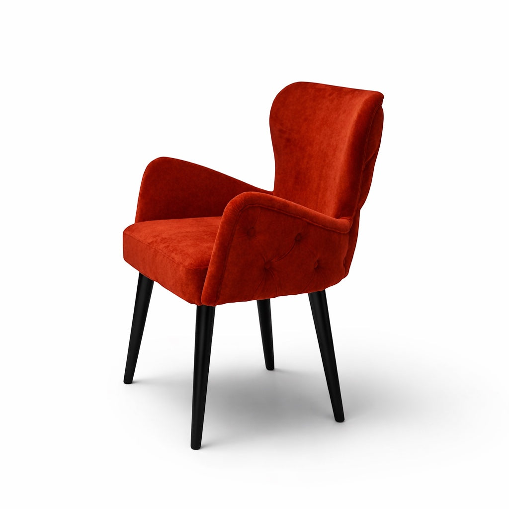 Vaya Home Sienna burnt orange velvet accent chair with button tufting and tapered black legs.