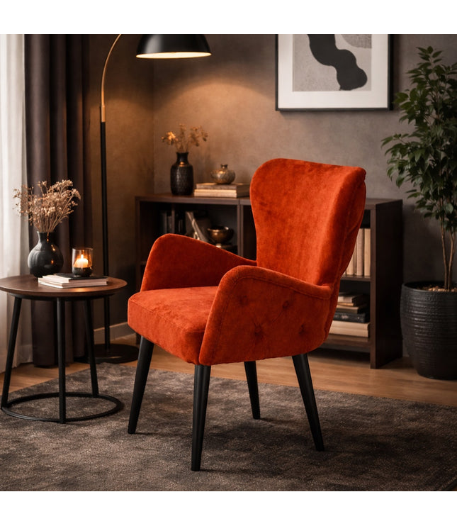 Vaya Home Sienna burnt orange velvet accent chair with button tufting and tapered legs.