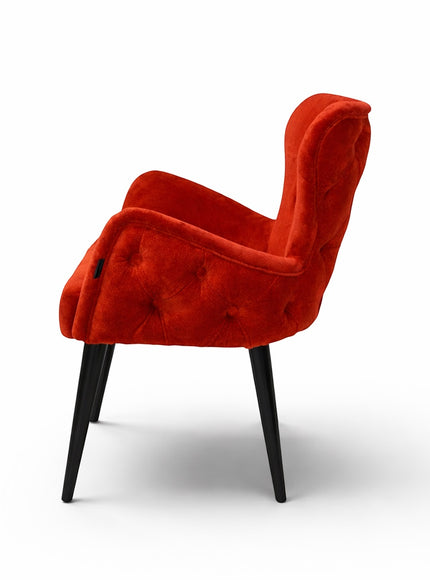 Vaya Home Sienna accent chair in vibrant red velvet with button tufting and black tapered legs.